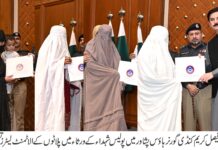 KP Governor distributes allotment letters for 54 residential plots among heirs of martyred policemen